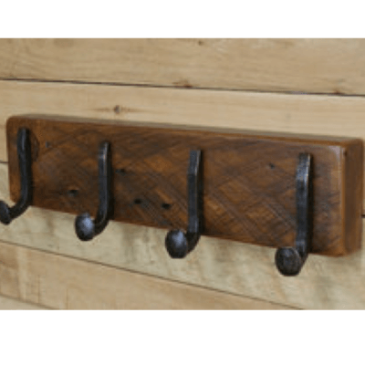 Reclaimed wood coat rack with railroad spike hooks